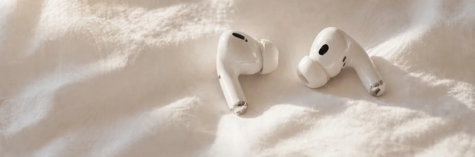 Person in bed with headphones